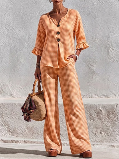 Two-piece Set Featuring A Plaid V-neck Top With Wooden Buttons And Ruffled Three-quarter Sleeves, Paired With Wide-leg Trousers