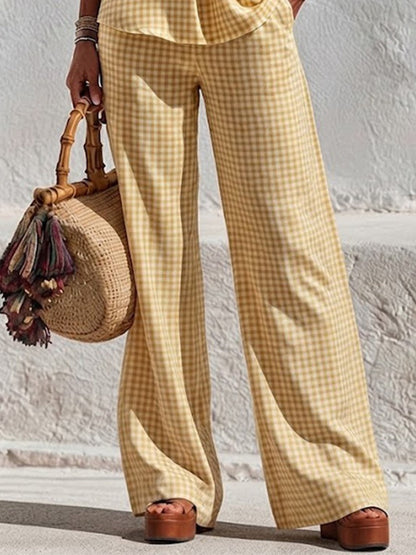 Two-piece Set Featuring A Plaid V-neck Top With Wooden Buttons And Ruffled Three-quarter Sleeves, Paired With Wide-leg Trousers