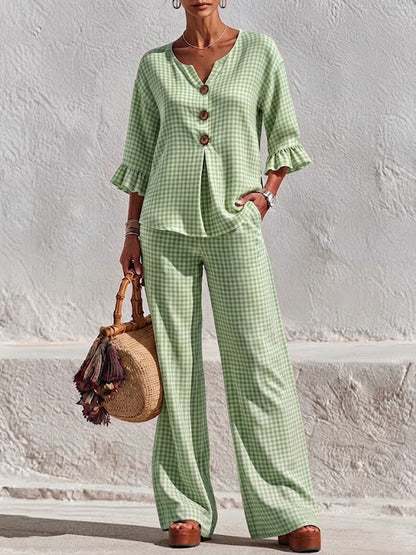 Two-piece Set Featuring A Plaid V-neck Top With Wooden Buttons And Ruffled Three-quarter Sleeves, Paired With Wide-leg Trousers