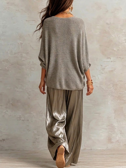 Two-piece Set Featuring A Relaxed-fit Knit Top And Glossy Trousers.
